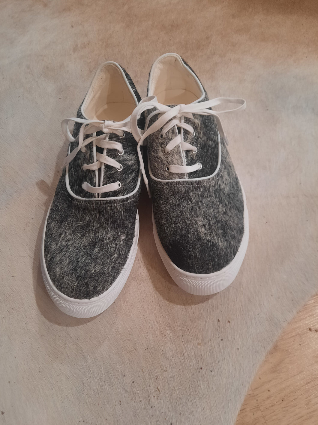 Cowhide trainers